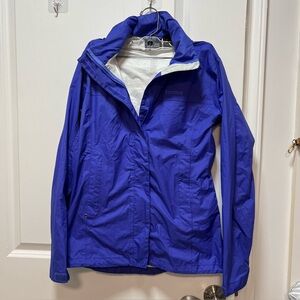 Women’s Marmot blue full zipper hooded windbreaker rain jacket. Size small